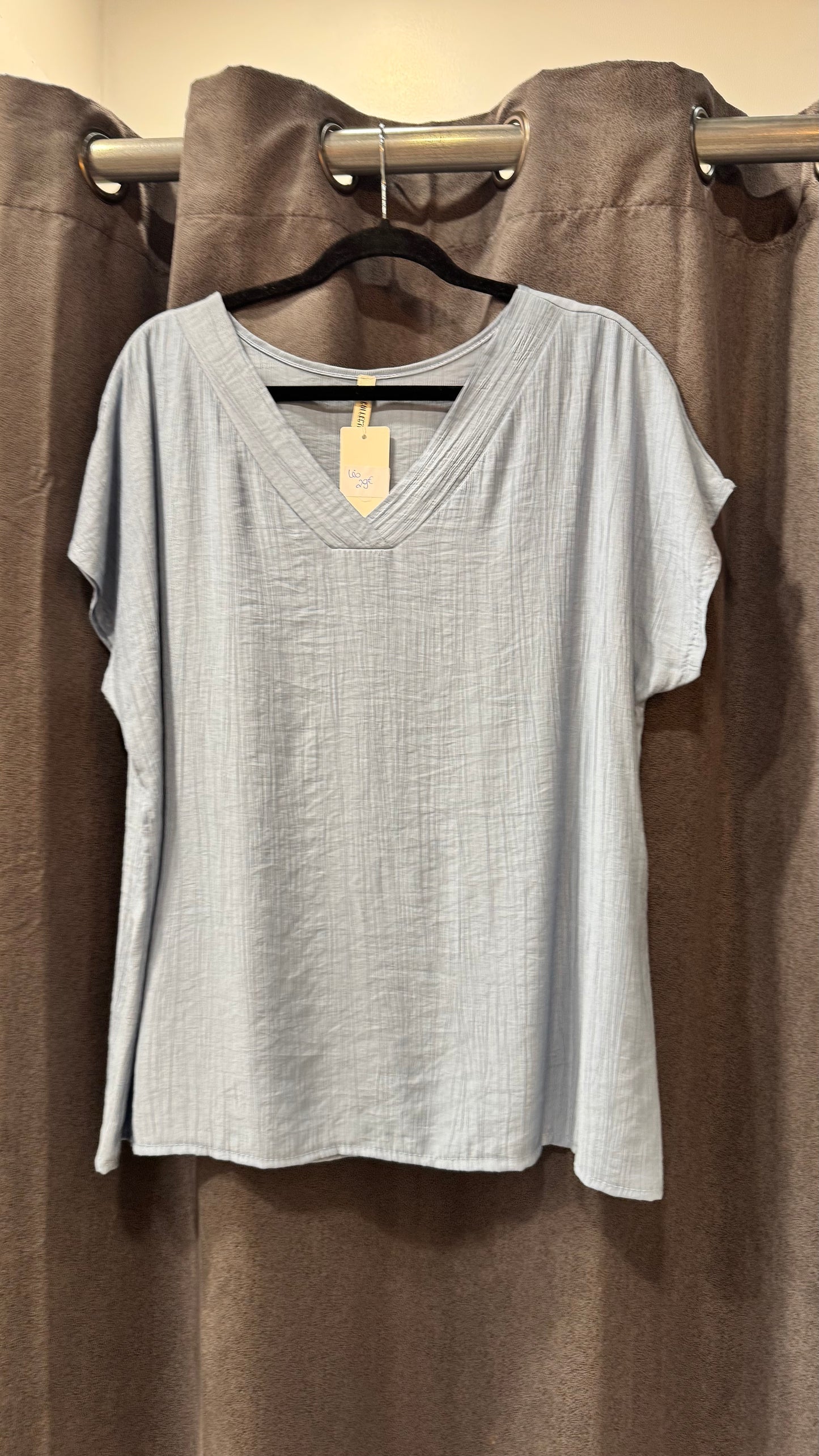 blouse col v femme
mode femme ronde
